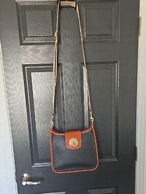 Dooney & Bourke Black and Brown Leather Crossbody with Gold Logo